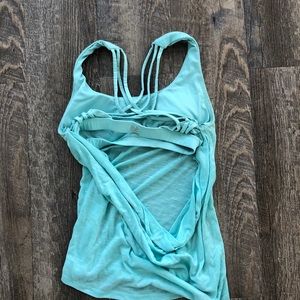 Tank with criss crossed built in bra and open back